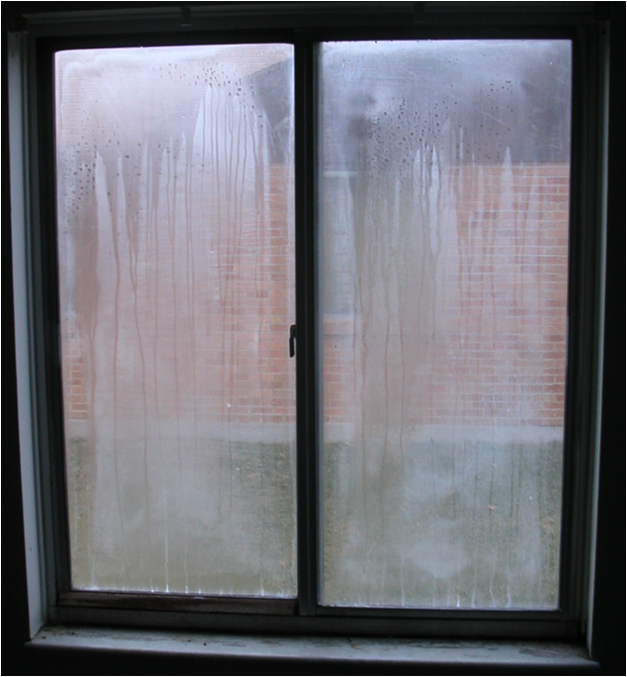 Moisture and streaks between the panes of a sliding window
