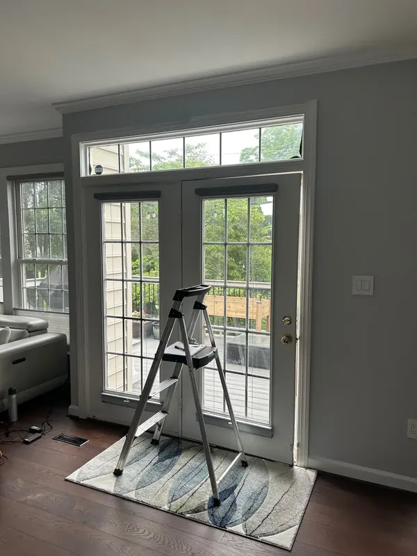 French patio doors are shown from inside the room.
